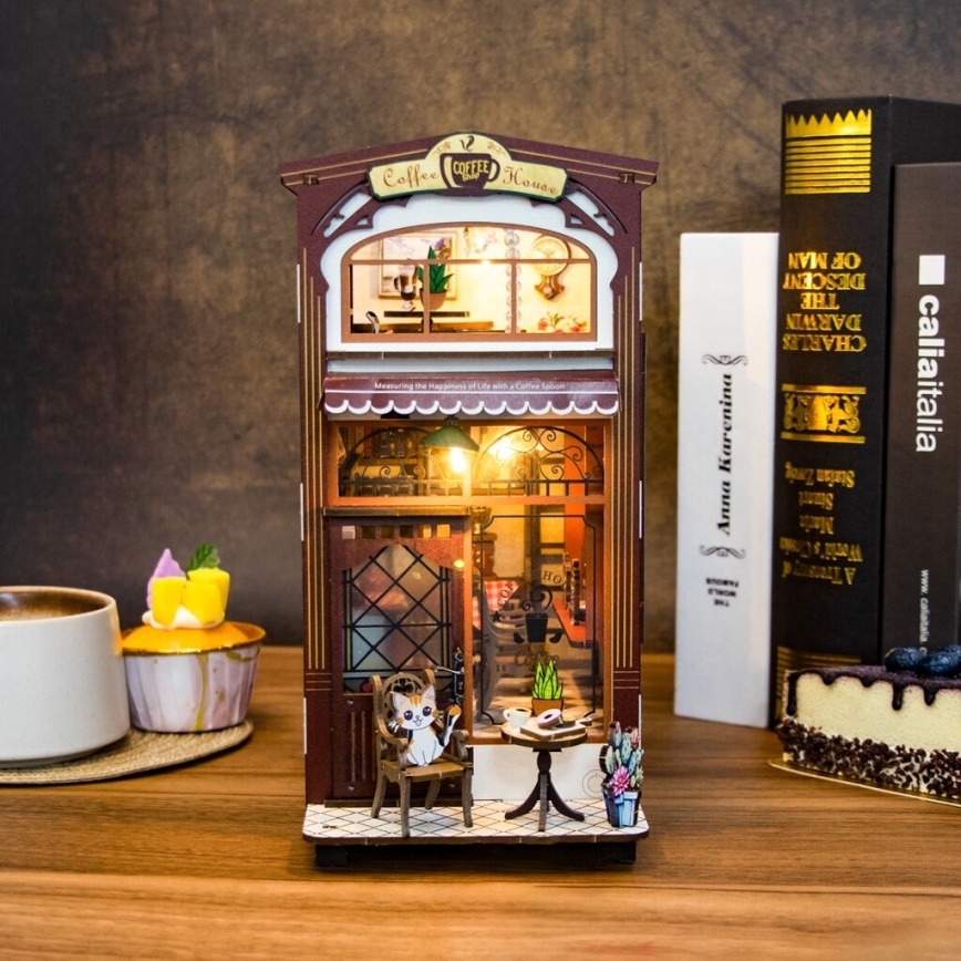 2Kids Toys - 3D dėlionė LED knygų laikiklis Kavinė 2xAAA