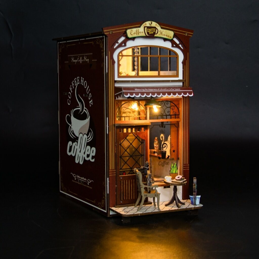 2Kids Toys - 3D dėlionė LED knygų laikiklis Kavinė 2xAAA