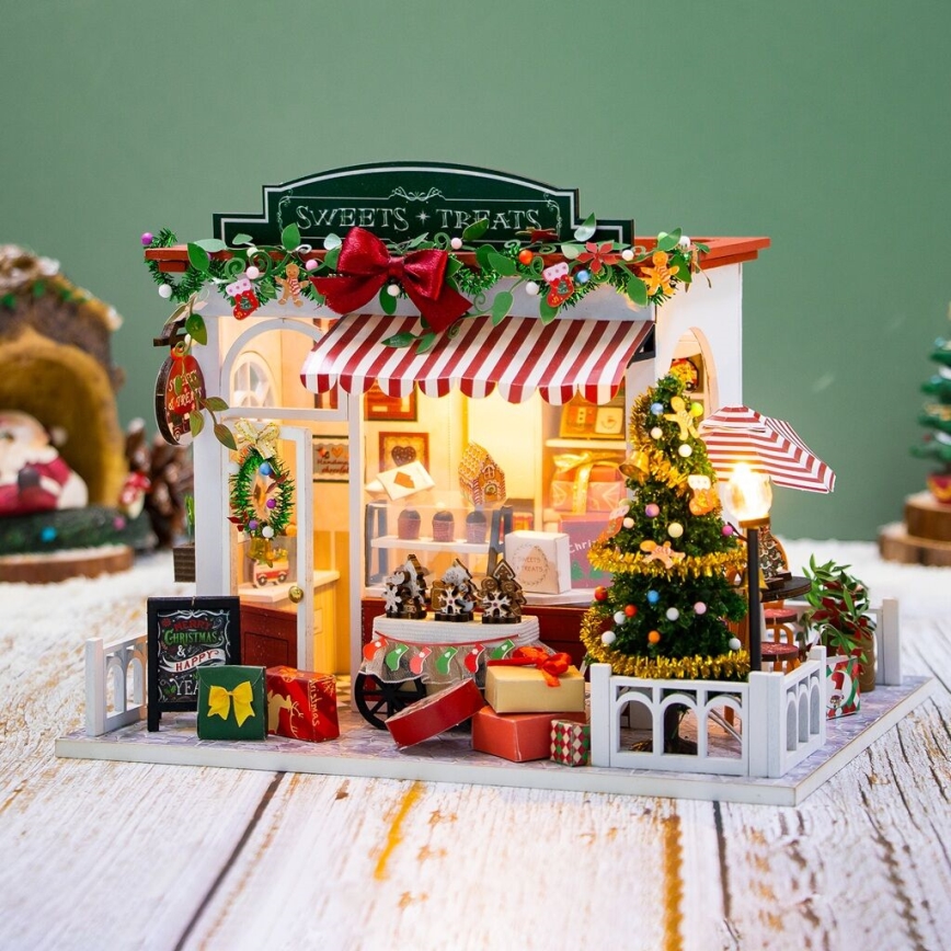 2Kids Toys - Miniatiūrinis namelis Kalėdinė saldainių parduotuvė 2xAAA