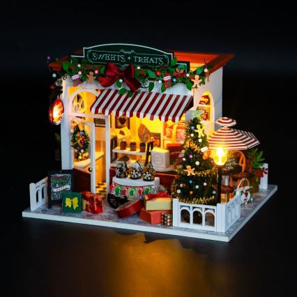2Kids Toys - Miniatiūrinis namelis Kalėdinė saldainių parduotuvė 2xAAA