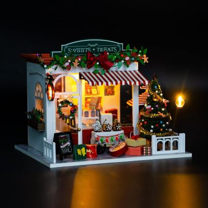 2Kids Toys - Miniatiūrinis namelis Kalėdinė saldainių parduotuvė 2xAAA