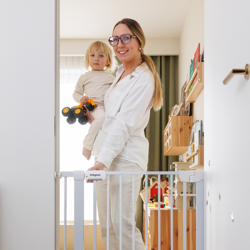 BabyOno - Apsauginė vartelė 75–96 cm balta