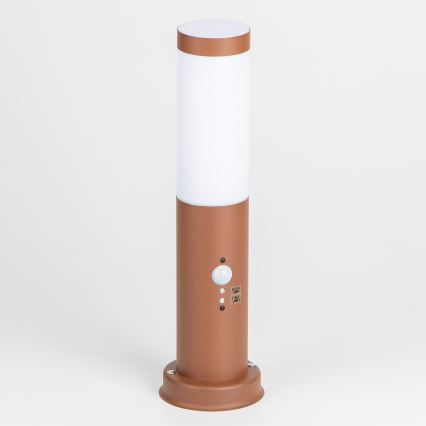 Brilagi - Lauko lempa su judesio jutikliu NOVA 1xE27/15W/230V 40 cm IP44 ruda