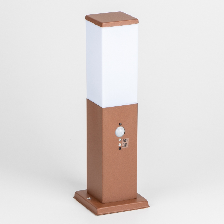 BRILAGI - Lauko šviestuvas su judesio jutikliu NOVA 1xE27/15W/230V 40 cm IP44 rudas