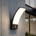 BRILAGI - LED lauko sieninis šviestuvas su judesio ir sutemų jutikliu ARCELO LED/12W/230V IP65 juoda