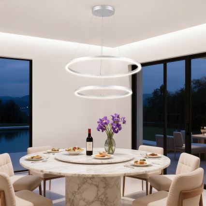 Brilagi - reguliuojama LED liustra ant troselio PORTOFINO LED/98W/230V 3000–6000K skersmuo 80 cm sidabrinė + nuotolinis valdymas