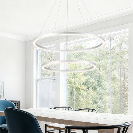 Brilagi - reguliuojama LED liustra ant troselio PORTOFINO LED/98W/230V 3000–6000K skersmuo 80 cm sidabrinė + nuotolinis valdymas