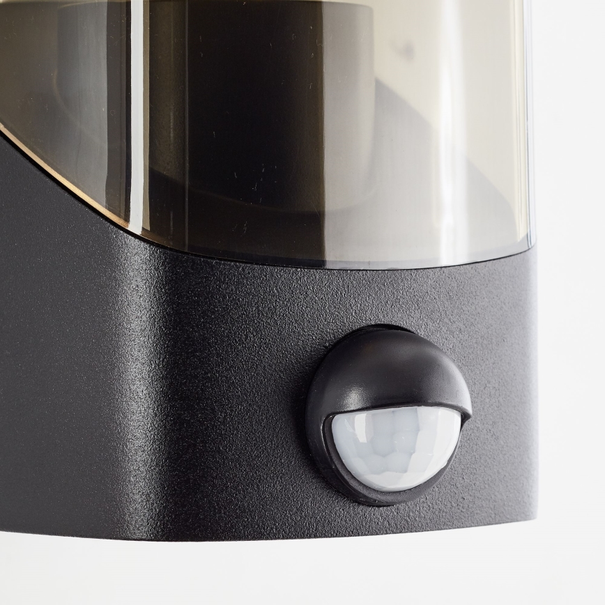 Brilliant - Lauko sieninis šviestuvas su jutikliu MINOU 1xE27/10W/230V IP44 juoda/dūminis