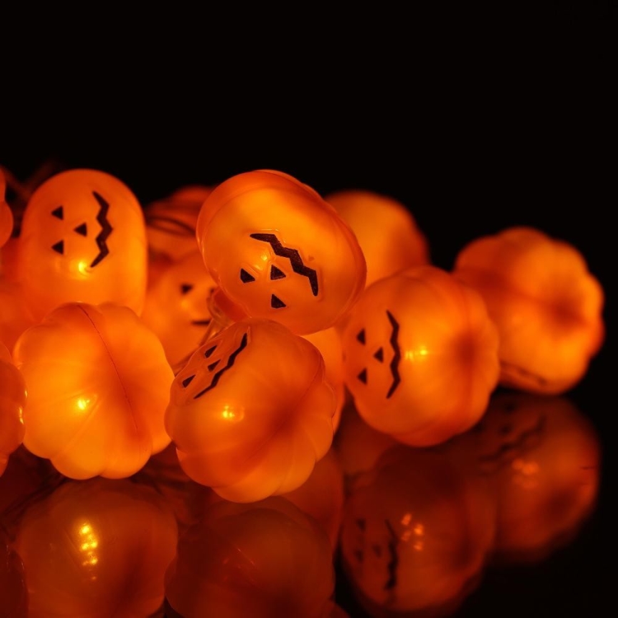 Dekoratyvinė LED grandinė HALLOWEEN 20xLED/3xAA/šilta balta 3,3m moliūgai
