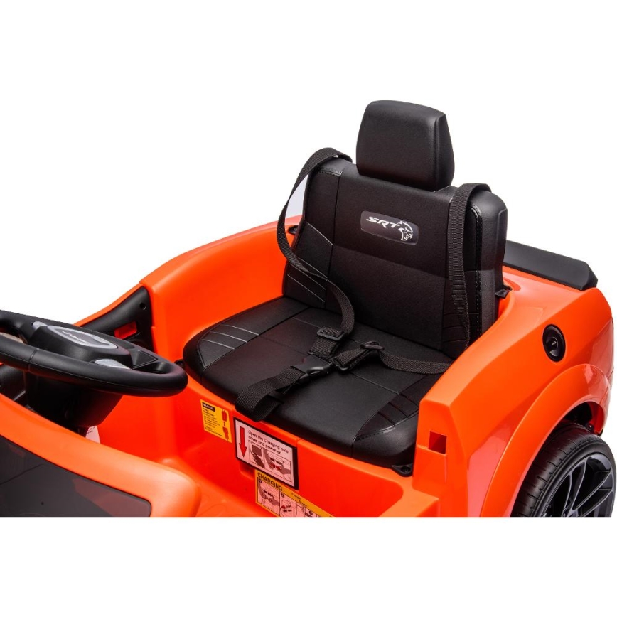 Elektrinis žaislinis automobilis Dodge Challenger 50W/4500 mAh oranžinės spalvos