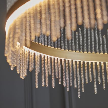 Endon 107672 - dimeriuojama LED liustra ant laido ADRIEL LED/83W/230V 3000K skersmuo 89 cm auksinė/skaidri