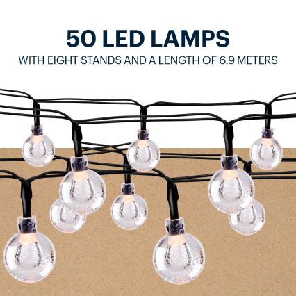 Grundig - LED grandinė, įkraunama saulės šviesa 50xLED/8 funkcijos 6,9m šilta balta