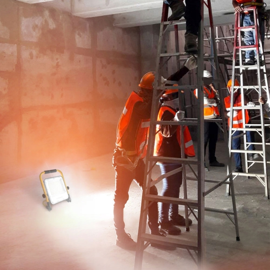 Įkraunamas LED prožektorius su stovu LED/100W/3,2V 5000K 5000 mAh IP65 oranžinis