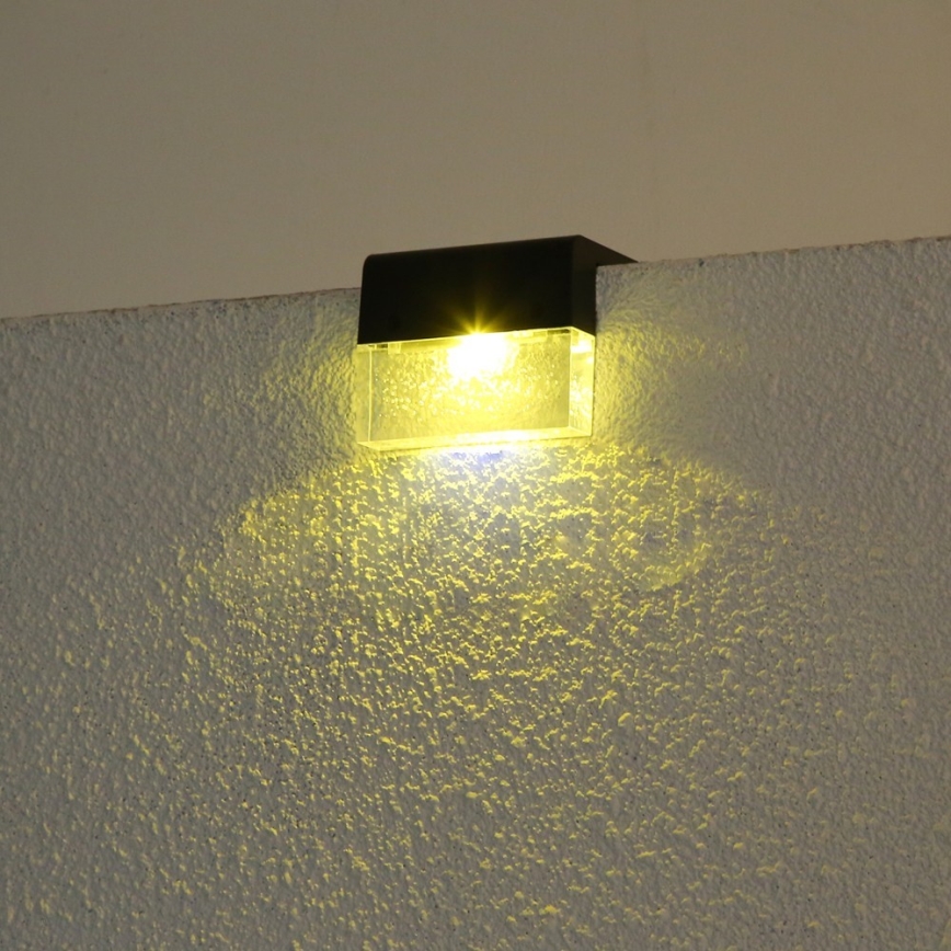 KOMPLEKTAS 2x LED RGB Saulės energija įkraunamas sieninis šviestuvas LED/1W/1,2V 3500K IP65