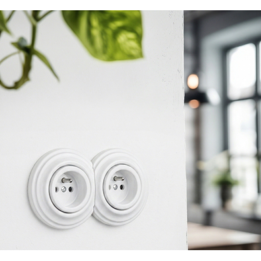 Kliklap - dviguba retro rozetė su rėmeliu, 230 V, sniego baltos spalvos