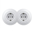 Kliklap - dviguba retro rozetė su SCHUKO rėmeliu, 230 V, sniego baltos spalvos