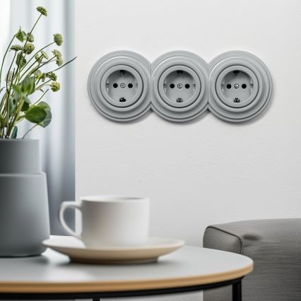 Kliklap - Triguba retro rozetė namams su rėmeliu SCHUKO 230V, pilka