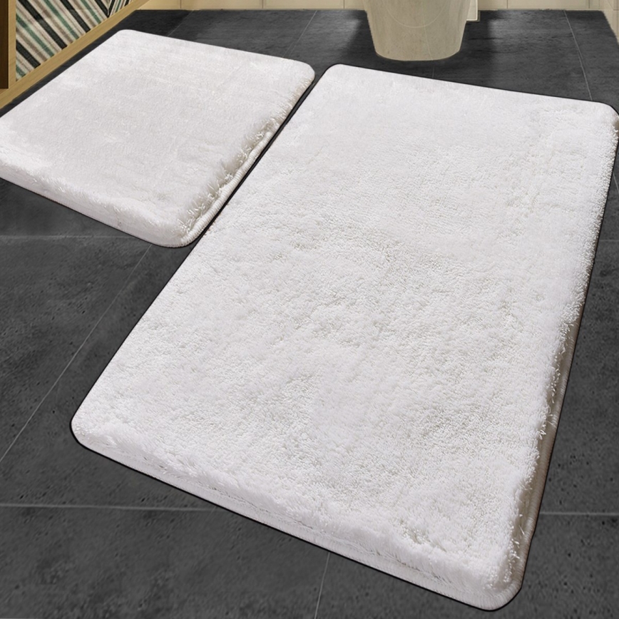 KOMPLEKTAS 2x Vonios kilimėlis 60/100 cm balta