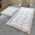 KOMPLEKTAS 2x Vonios kilimėlis STONE 60/100 cm balta