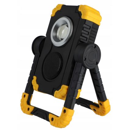 Įkraunamas LED prožektorius su garsiakalbiu ir powerbank funkcija LED/10W/5V 4400 mAh IP44 juoda/geltona