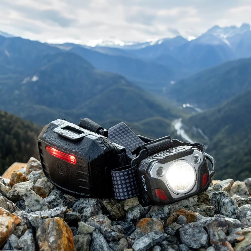 LED Pritemdomas įkraunamas galvos žibintas su jutikliu su maitinimo bloko funkcija ir raudonas šviestuvas LED/10W/5V IP44 1200 blizgus 4000 mAh