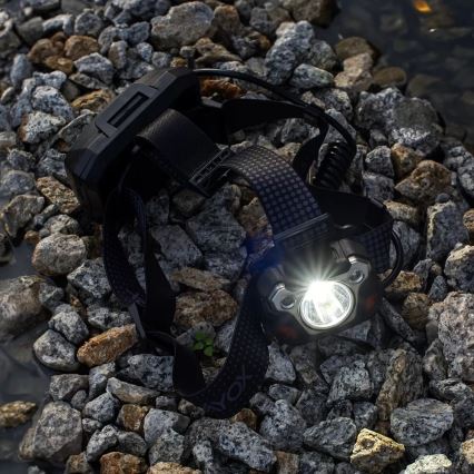 LED Pritemdomas įkraunamas galvos žibintas su jutikliu su maitinimo bloko funkcija ir raudonas šviestuvas LED/10W/5V IP44 1200 blizgus 4000 mAh