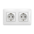 Legrand - Dviguba namams skirta SCHUKO rozetė su rėmeliu NILOE 250V balta