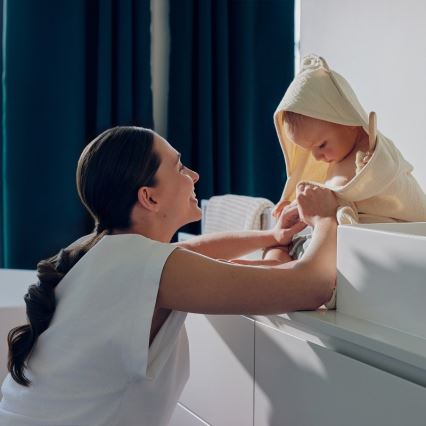 Lionelo - Vaikiškas muslininis rankšluostis su kapišonu Smėlio Cappuccino