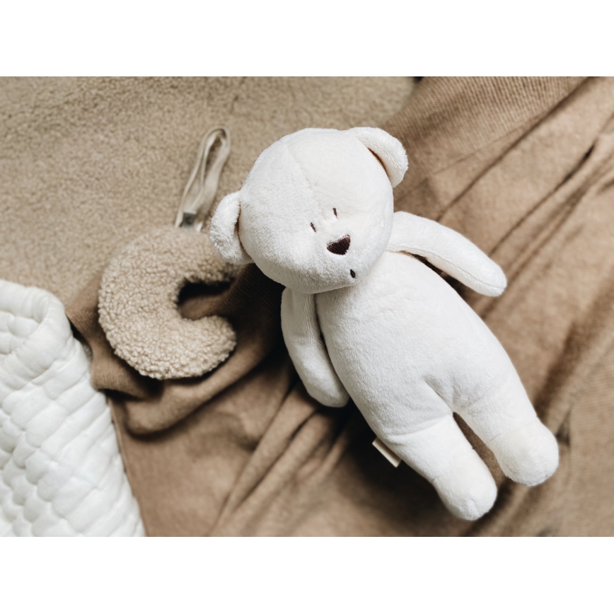 Moonie - Snuggle buddy su melodija ir šviesa meškiukas 2.0 cream