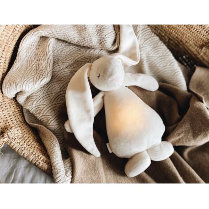 Moonie - Snuggle buddy su melodija ir šviesa zuikis 2.0 organic Smėlis