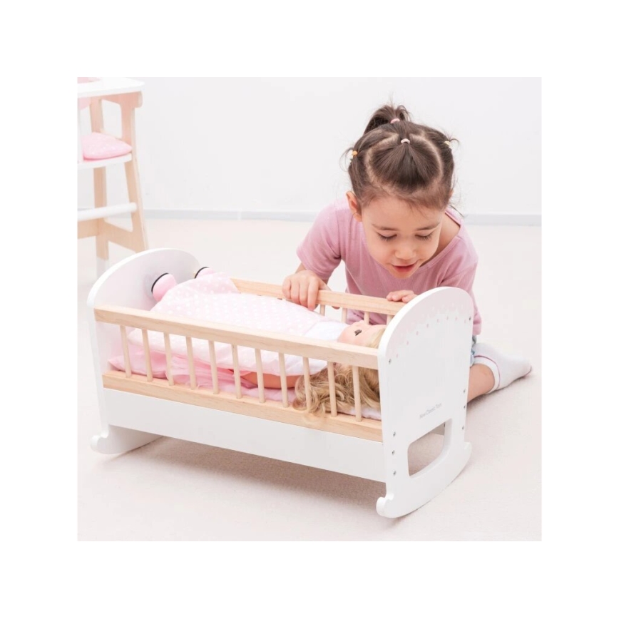 New Classic Toys - Medinė lova lėlėms rausva