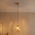 Pakabinamas šviestuvas ant laido CRISTAL 1xE14/15W/230V žalvaris/dūminė smėlinė