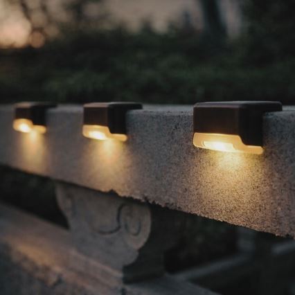 Rabalux - 4 vnt. LED saulės sieninių šviestuvų rinkinys su sutemų jutikliu LED/0,06W/1,2V 300 mAh IP44