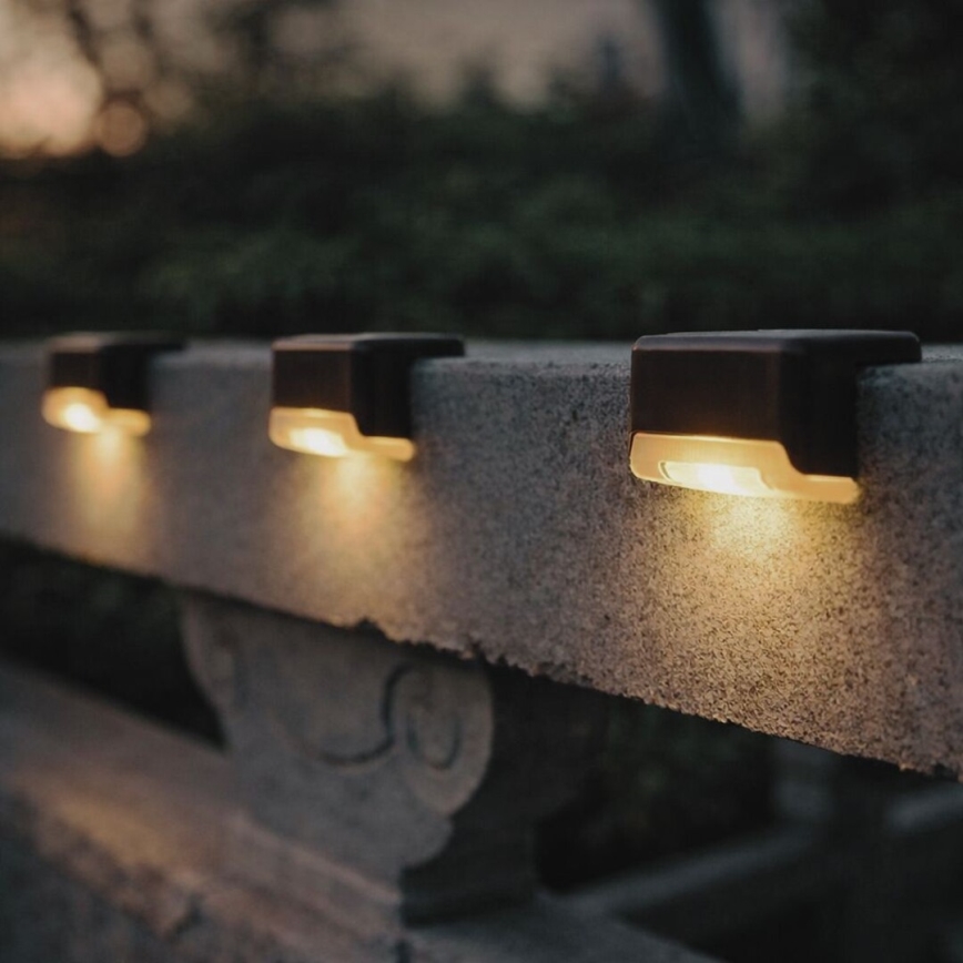 Rabalux - 4 vnt. LED saulės sieninių šviestuvų rinkinys su sutemų jutikliu LED/0,06W/1,2V 300 mAh IP44