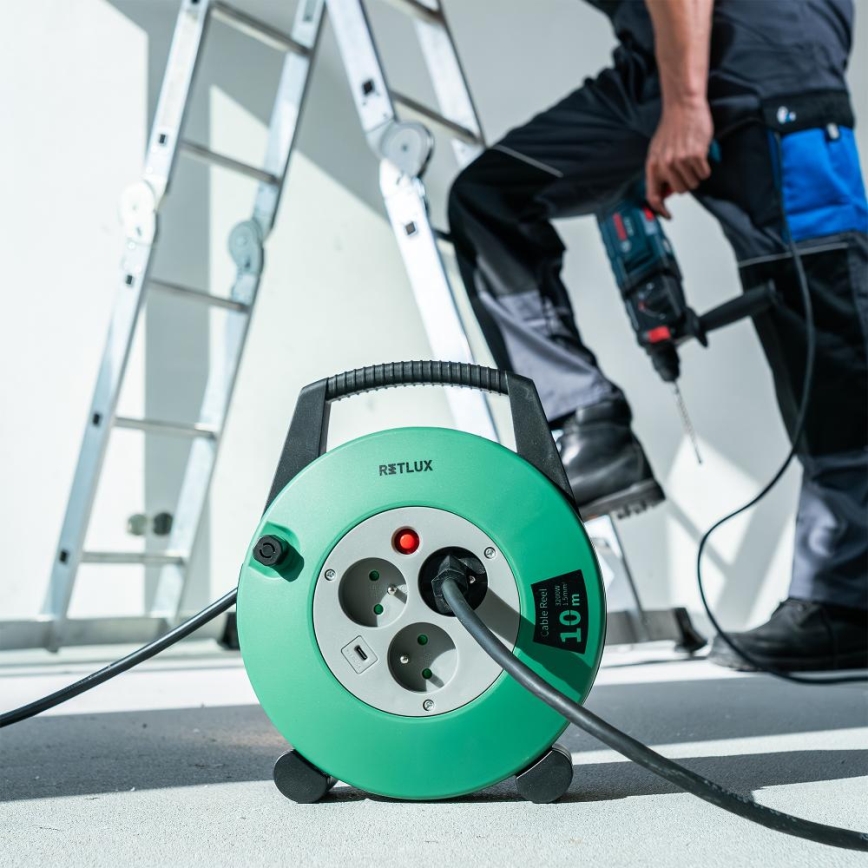 Retlux - 10 m pailgintojas ant ritės, 3 lizdai, E tipo, žalia/juoda
