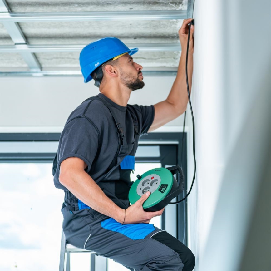 Retlux - 10 m pailgintojas ant ritės, 3 lizdai, E tipo, žalia/juoda