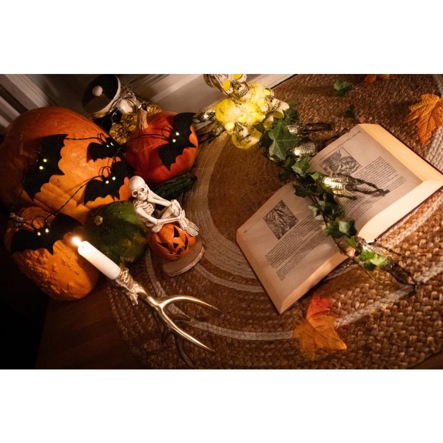 Dekoratyvinė LED grandinė HALLOWEEN 10xLED/2xAA/šilta balta 1,3m šikšnosparniai