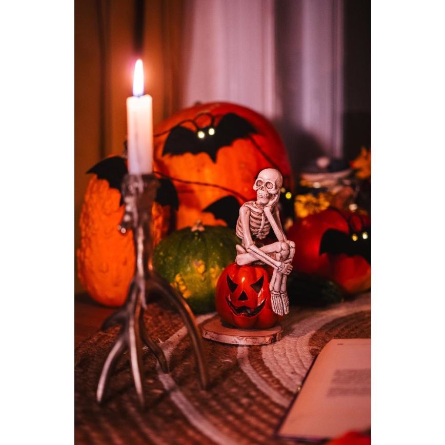Dekoratyvinė LED grandinė HALLOWEEN 10xLED/2xAA/šilta balta 1,3m šikšnosparniai