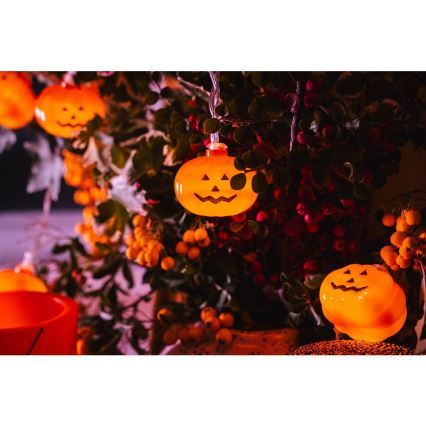 Dekoratyvinė LED grandinė HALLOWEEN 20xLED/3xAA/šilta balta 3,3m moliūgai