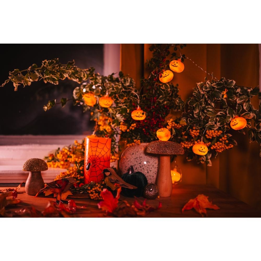 Dekoratyvinė LED grandinė HALLOWEEN 20xLED/3xAA/šilta balta 3,3m moliūgai