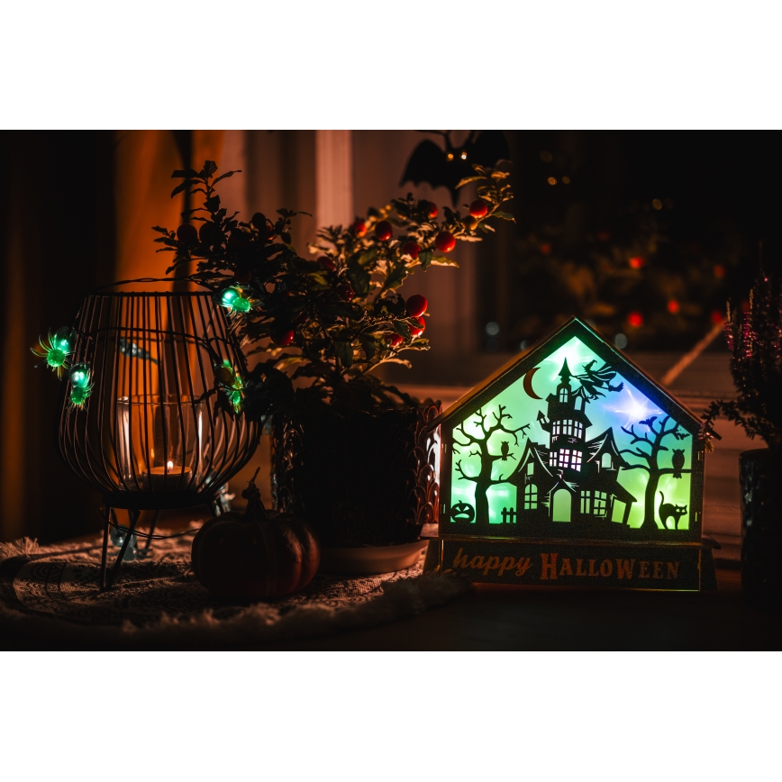 LED Dekoracija HALLOWEEN LED/2xAA/įvairiaspalvė baisi namelis