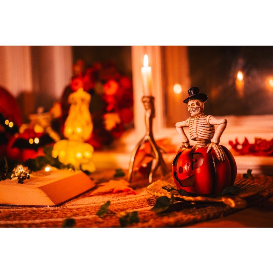 LED Dekoracija HALLOWEEN LED/2xLR44/šilta balta skeletas moliūge derva