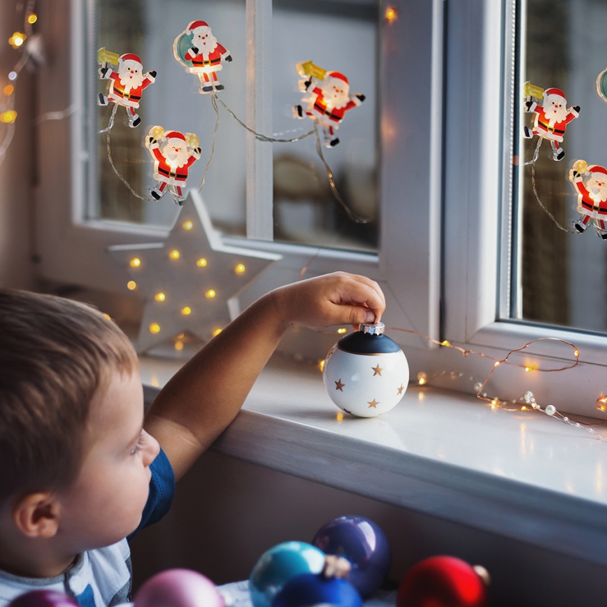 LED Kalėdinė girlianda su siurbtukais 6xLED/2xAA 1,2m šiltai balta santa
