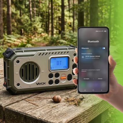 Stovyklavimo radijas su rankiniu generatoriumi, saulės moduliu ir LED žibintu su powerbank funkcija 5V/3xAAA/2000 mAh IPX4 žalia